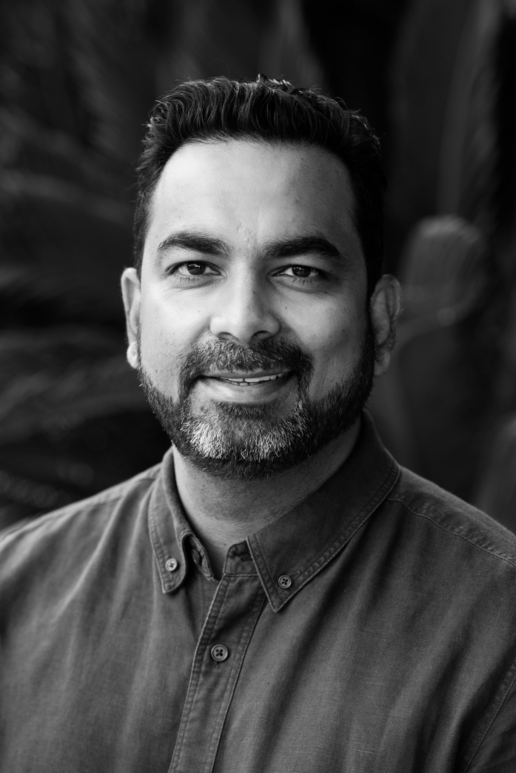 Dr. Guru Yajaman, a skilled general practitioner, providing medical consultation at Kildare Road Medical Centre in Blacktown, wearing a white coat and stethoscope, in a modern and well-equipped clinic setting